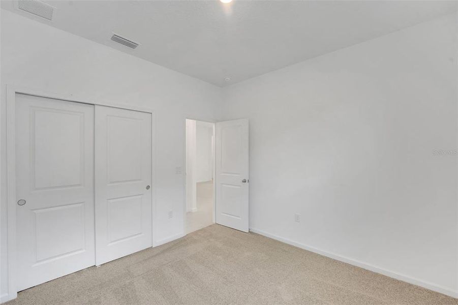Spacious, unfurnished interior of a new home in Annabelle Estates, Winter Haven (Image 32).