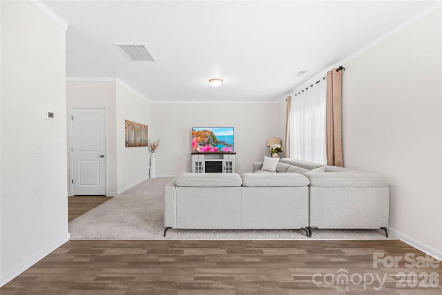 Furnished interior view inside a new home in Orchard Creek, Charlotte (Image 12).
