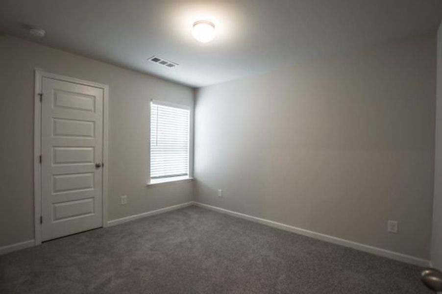 Representative unfurnished interior of a home built from the Rutherford by Piedmont Residential in Owen Preserve, Canton (Image 13).