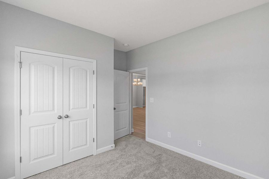 Representative unfurnished interior of a home built from the Weymouth by Caviness & Cates Communities in Bartlett Manor, Youngsville (Image 99).