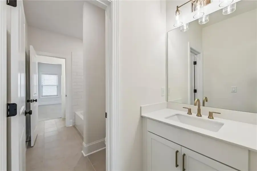 Furnished interior view inside a new home in Waterhaven, Cumming (Image 11).