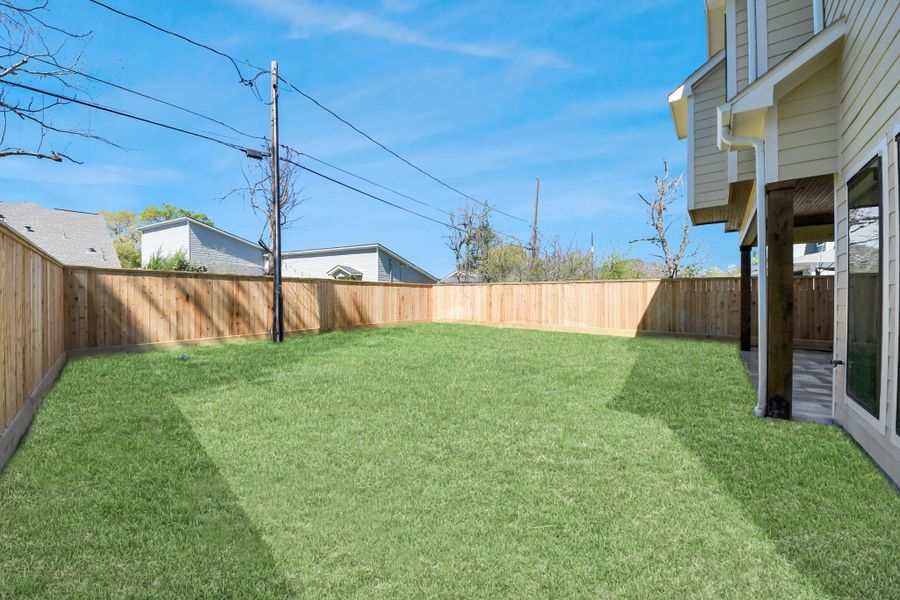Exterior details and patio area of a home in , Houston (Image 3).