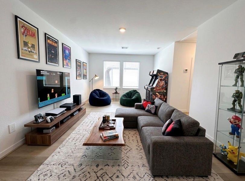 Virtually staged gameroom on 2/F