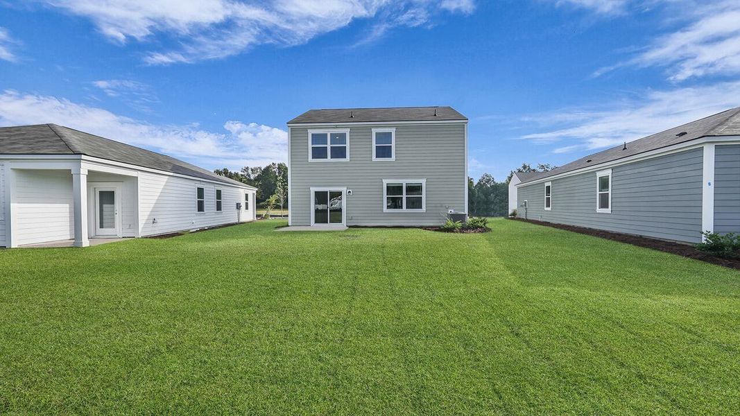 Exterior details and patio area of a home in The Oaks at Center Station, Hollywood (Image 24).