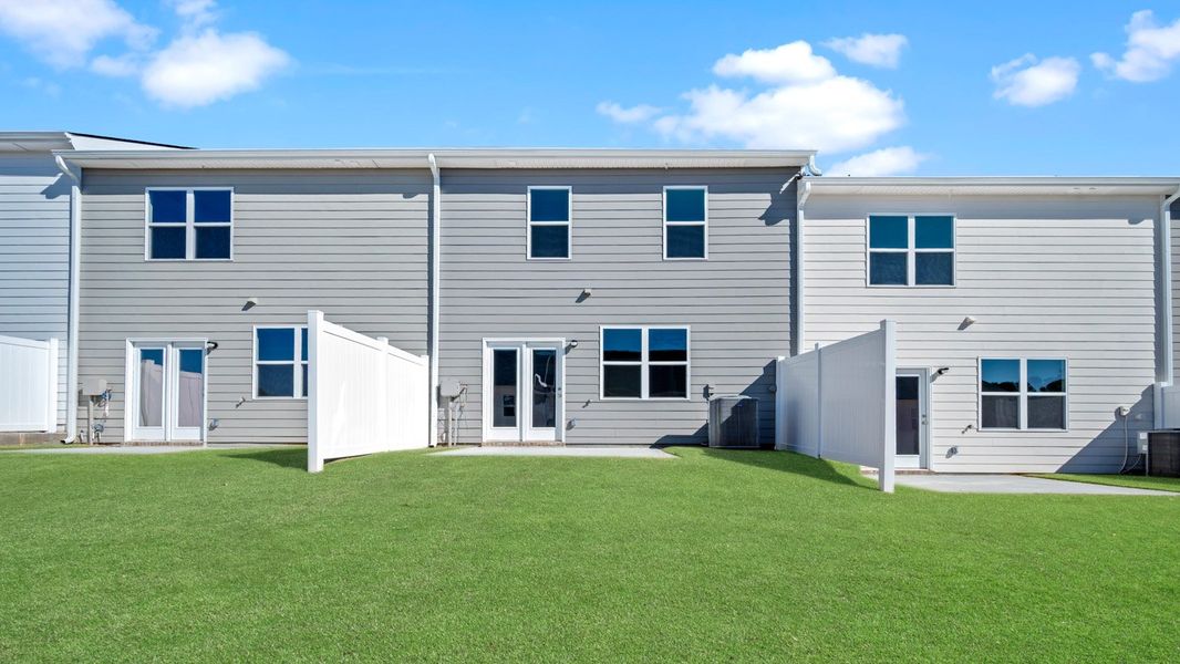 Exterior details and patio area of a home in Inverness at Sugarloaf, Lawrenceville (Image 2). Exterior details and patio area of a home in Inverness at Sugarloaf, Lawrenceville (Image 2).