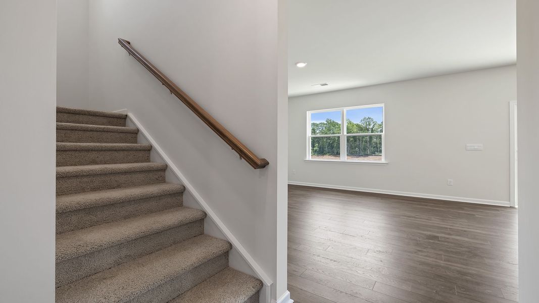 Spacious, unfurnished interior of a new home in Durbin Meadows Traditions, Fountain Inn (Image 17).