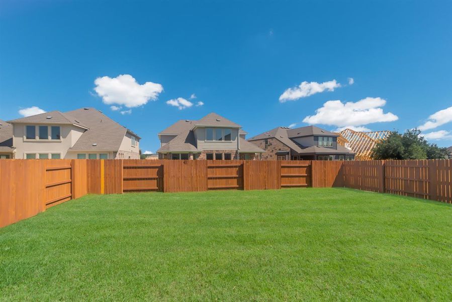 Front exterior of a new home in Oaks at San Gabriel, Georgetown, TX, highlighting curb appeal (Image 18).