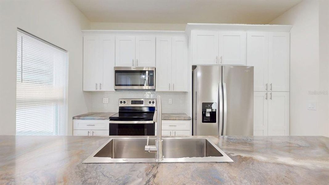 Furnished interior view inside a new home in , Tampa (Image 33).