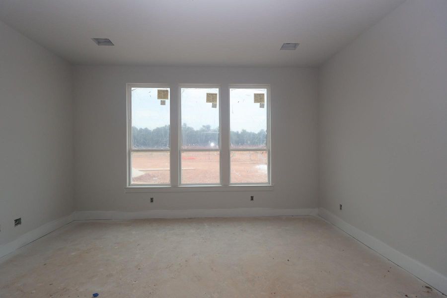 In-progress construction of a new home in Clopton Farms, Montgomery, TX (Image 11).