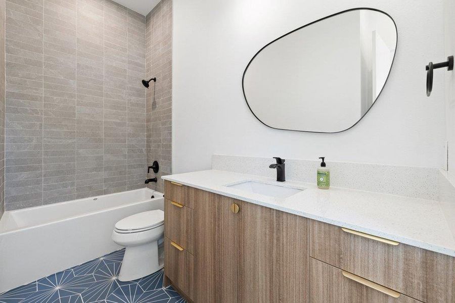 Bathroom featuring vanity and tub / shower combination