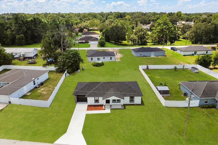 Front exterior of a new home in , Dunnellon, FL, highlighting curb appeal (Image 26).
