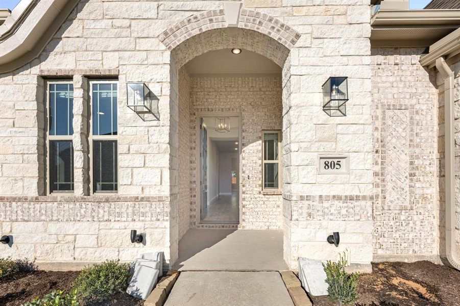 Exterior details and patio area of a home in Hayes Crossing, Midlothian (Image 4).