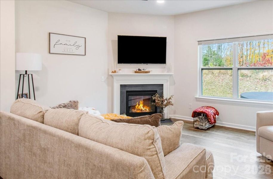 Spacious living room with gas fireplace Spacious living room with gas fireplace