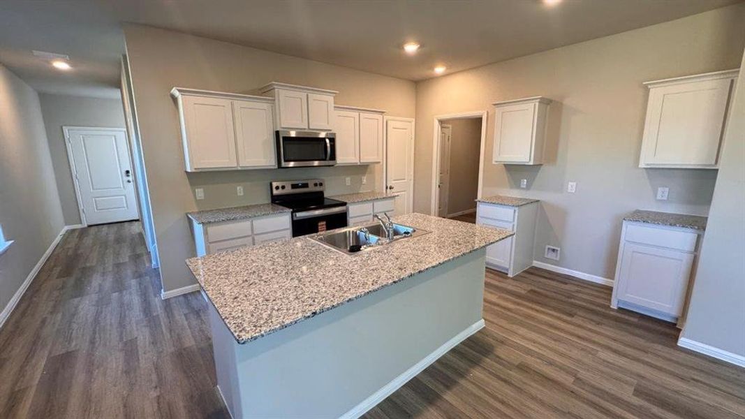 Kitchen - All Home and community information, including pricing, included features, terms, availability and amenities, are subject to change at any time without notice or obligation. All Drawings, pictures, photographs, video, square footages, floor plans, elevations, features, colors and sizes are approximate for illustration purposes only and will vary from the homes as built.