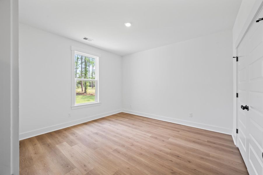 Spacious, unfurnished interior of a new home in Long Bay Golf Club, Longs (Image 28).