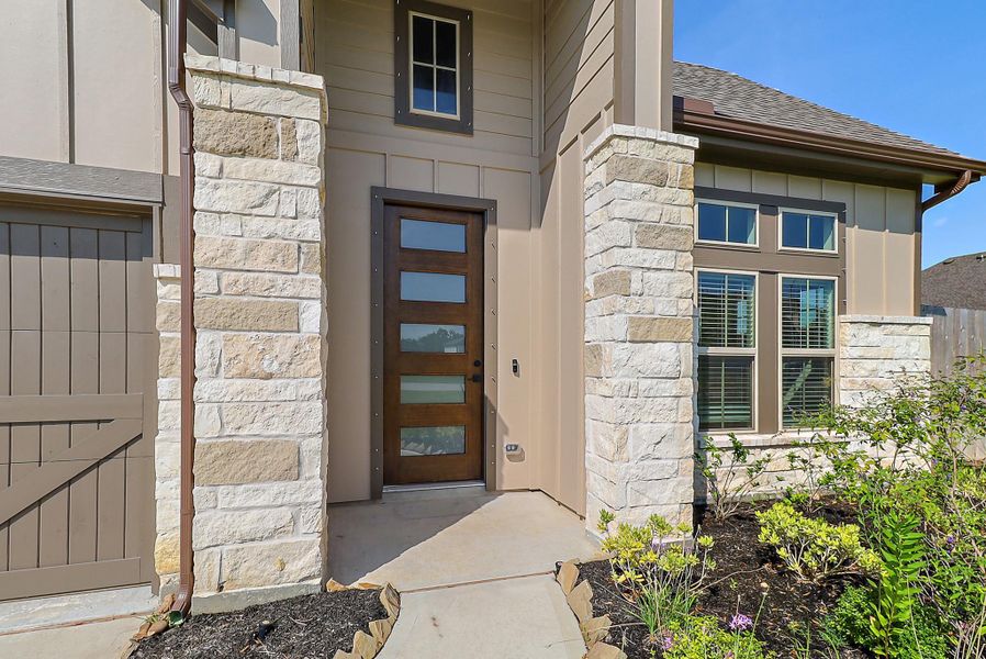 Front exterior of a new home in , Baytown, TX, highlighting curb appeal (Image 21). Front exterior of a new home in , Baytown, TX, highlighting curb appeal (Image 21).