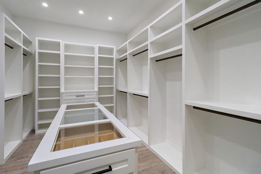 Another view of the walk-in closet Another view of the walk-in closet