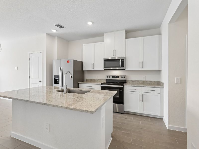 Furnished interior view inside a new home in The District at Oakleaf - The Commons, Middleburg (Image 4).