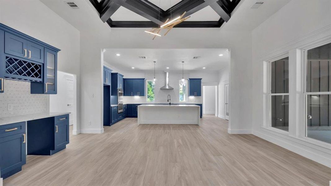 View of the kitchen and formal dining room.  Dining area has a view of the back yard. all the cabinets and drawers are soft close.