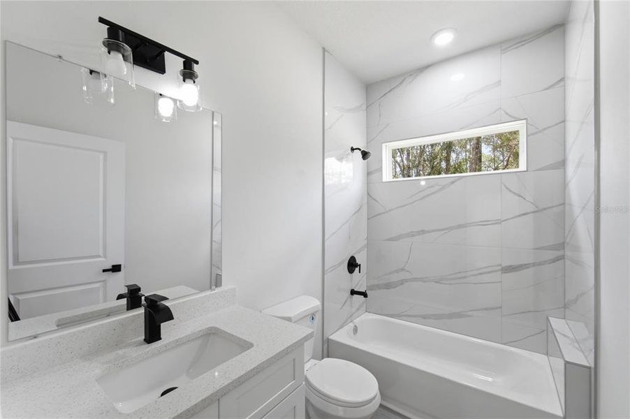Furnished interior view inside a new home in , Dunnellon (Image 6).