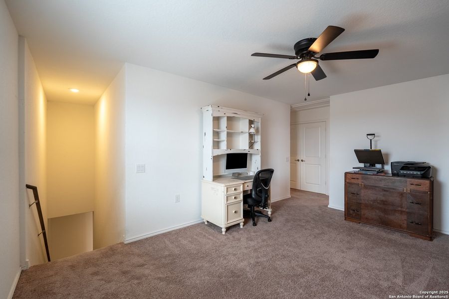 Furnished interior view inside a new home in Mission del Lago: Cottage Collection, San Antonio (Image 10).