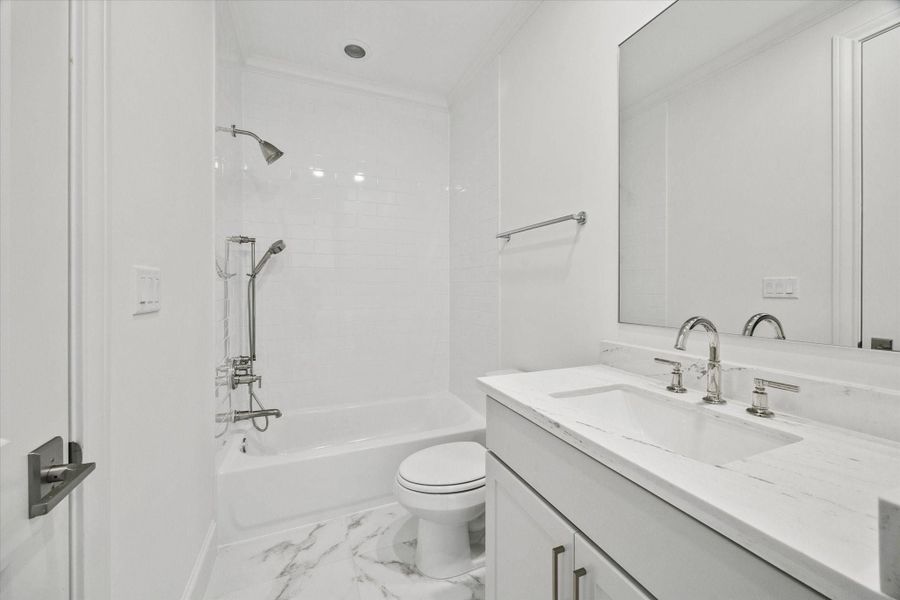 One of three secondary bathrooms