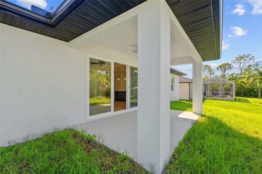 Exterior details and patio area of a home in , Port Charlotte (Image 2).