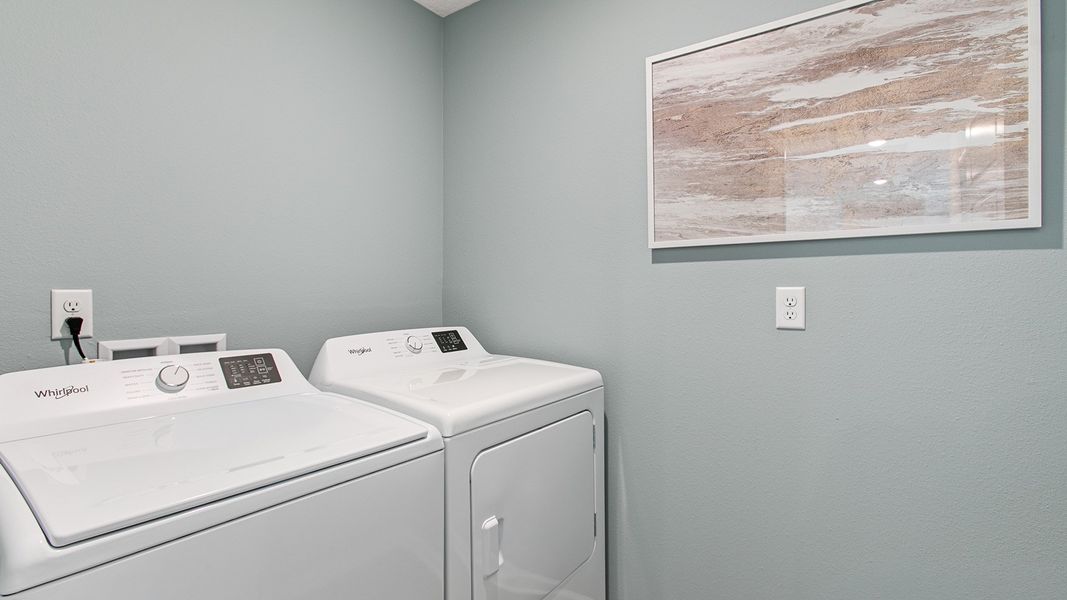 Representative furnished interior of a home built from the HAYDEN II by D.R. Horton in Copes Landing, Jacksonville (Image 32).