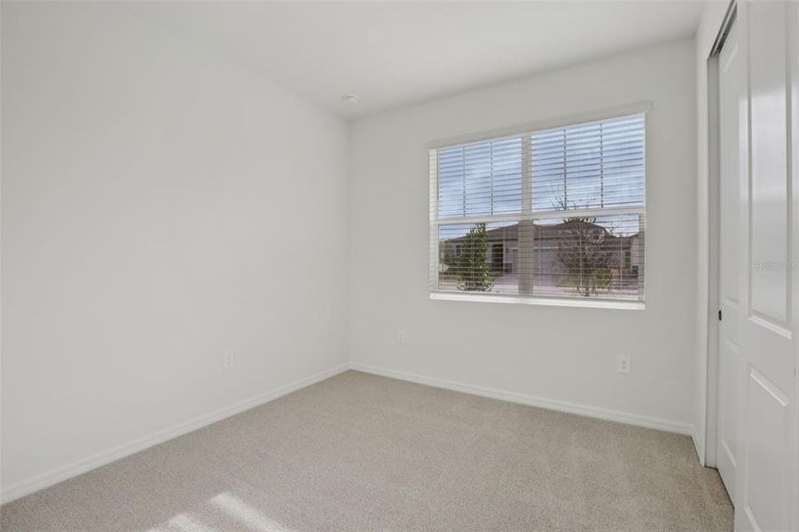 Spacious, unfurnished interior of a new home in Coasterra - Reserve Series, Palmetto (Image 22).