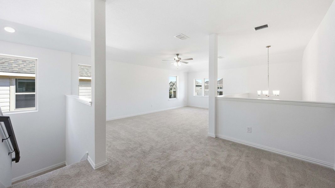 Furnished interior view inside a new home in Oaks at San Gabriel, Georgetown (Image 13).