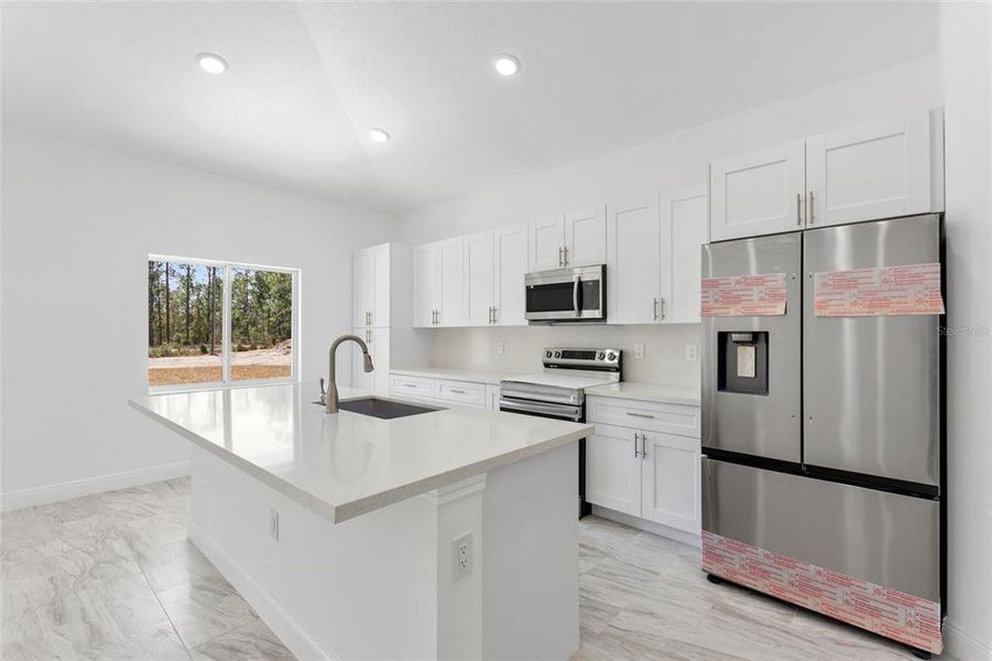 Furnished interior view inside a new home in , Indian Lake Estates (Image 6).
