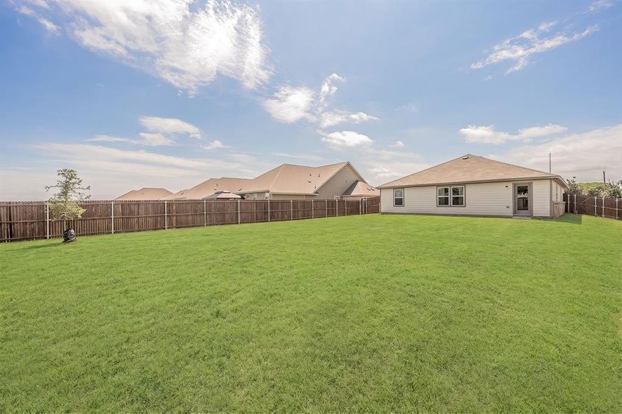 Exterior details and patio area of a home in Craftsman’s Corner, Cleburne (Image 22).