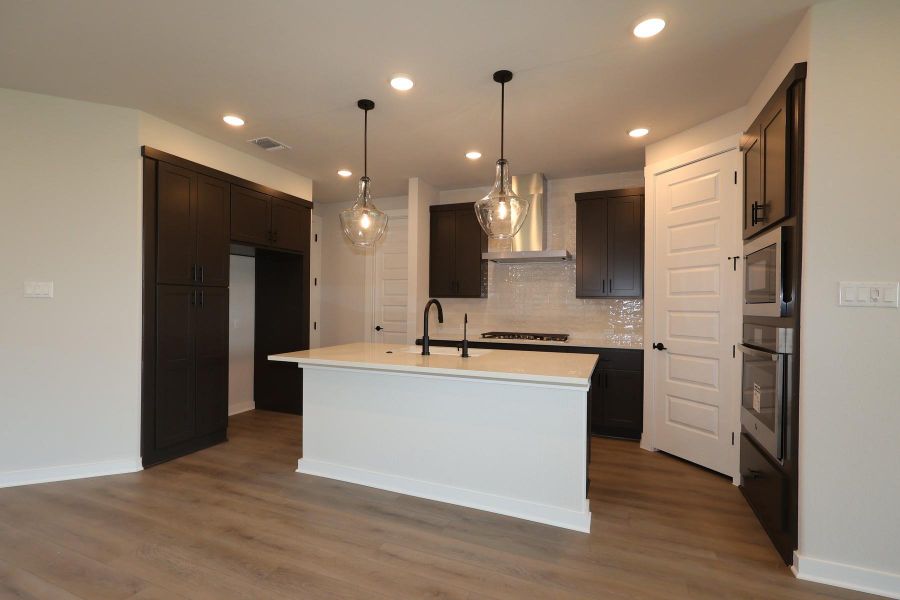 Furnished interior view inside a new home in Flora, Hutto (Image 4).