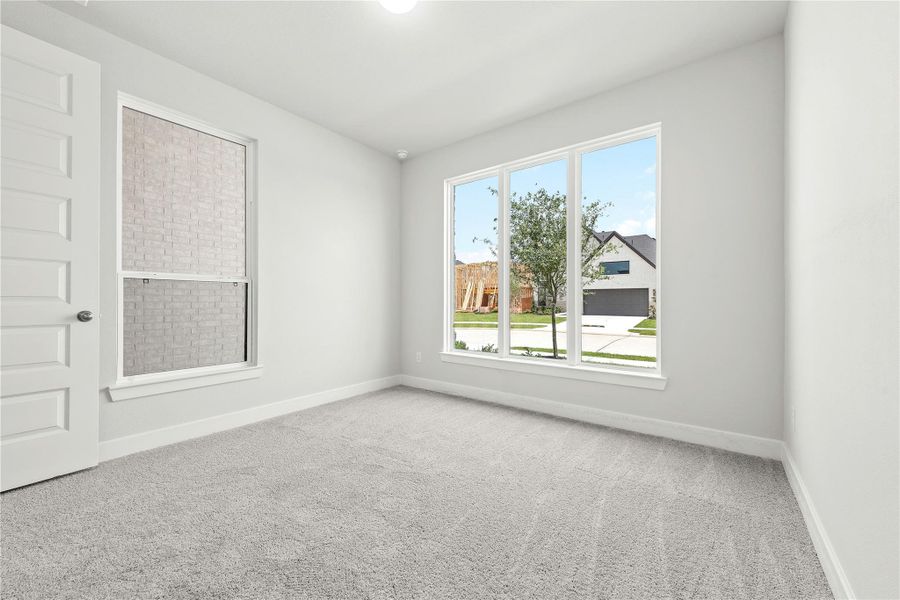 Spacious, unfurnished interior of a new home in Sunterra, Katy (Image 18).