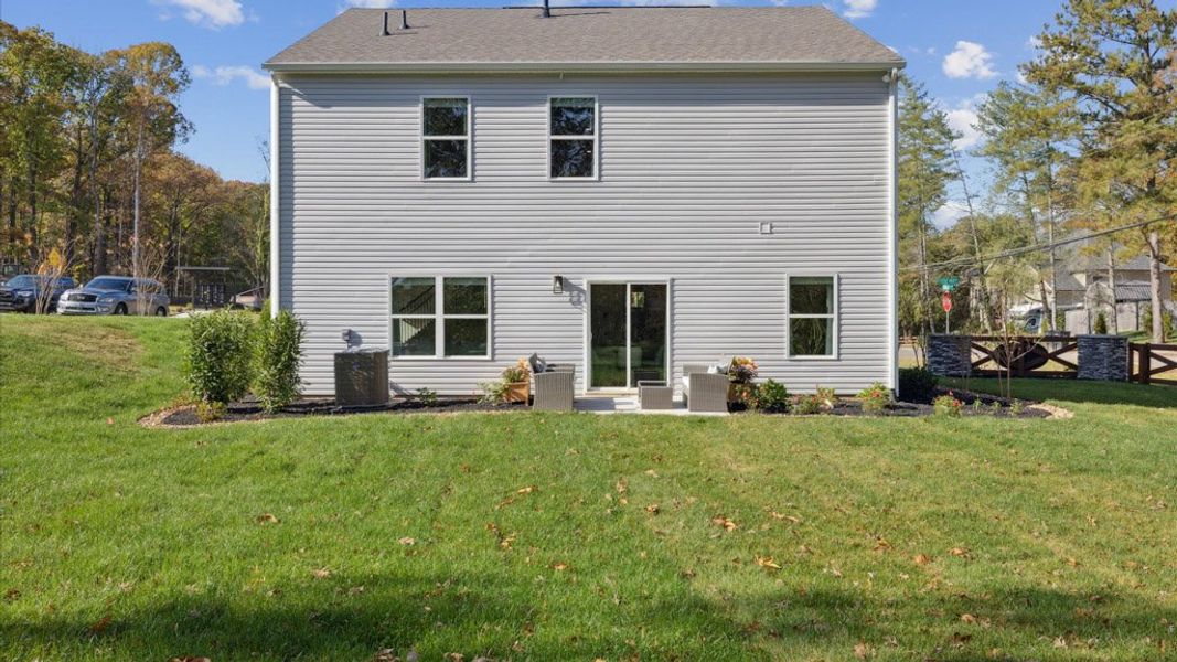 Front exterior of a new home in The Hideaway at Fox Meadows, Bluff City, TN, highlighting curb appeal (Image 2). Front exterior of a new home in The Hideaway at Fox Meadows, Bluff City, TN, highlighting curb appeal (Image 2).