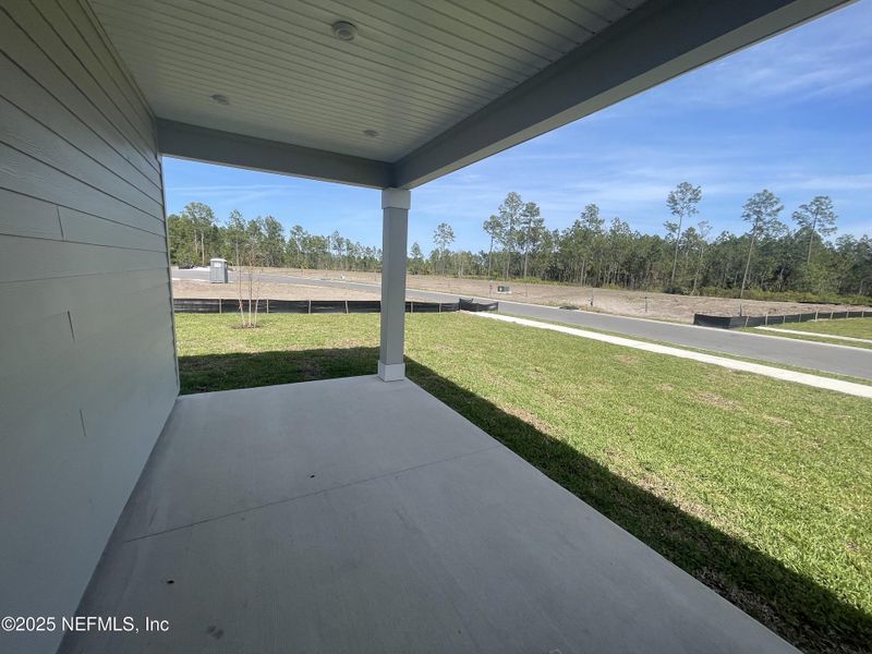 Exterior details and patio area of a home in Magnolia Series at Seminole Palms, Palm Coast (Image 20).