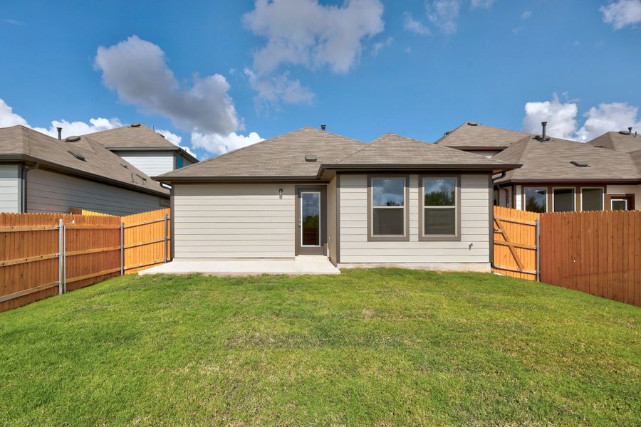 Exterior details and patio area of a home in Trinity Ranch, Elgin (Image 3).