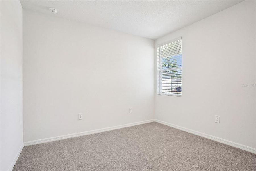 Spacious, unfurnished interior of a new home in Ridgehaven - Villas, Ormond Beach (Image 35).