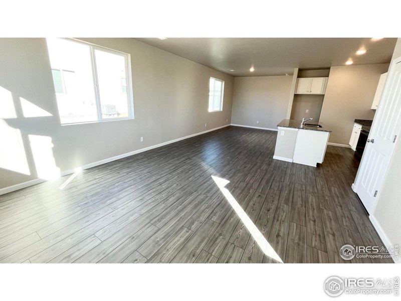 Huge windows and low maintenance Luxury Vinyl Plank Flooring Huge windows and low maintenance Luxury Vinyl Plank Flooring