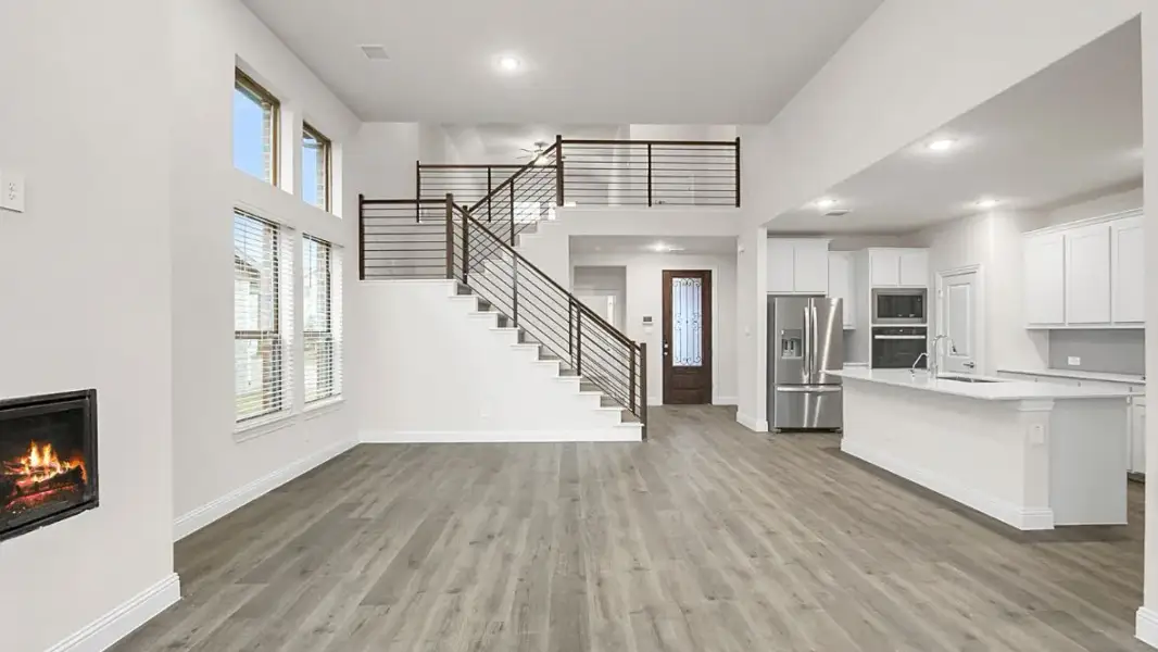 Representative unfurnished interior of a home built from the Estes by D.R. Horton in White Rock Trail Addition, Dallas (Image 15). Representative unfurnished interior of a home built from the Estes by D.R. Horton in White Rock Trail Addition, Dallas (Image 15).