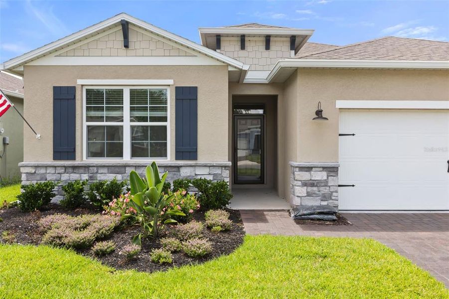 Front exterior of a new home in , New Smyrna Beach, FL, highlighting curb appeal (Image 17). Front exterior of a new home in , New Smyrna Beach, FL, highlighting curb appeal (Image 17).
