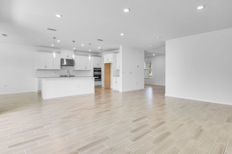 Spacious, unfurnished interior of a new home in Ardisia Park, New Smyrna Beach (Image 39).