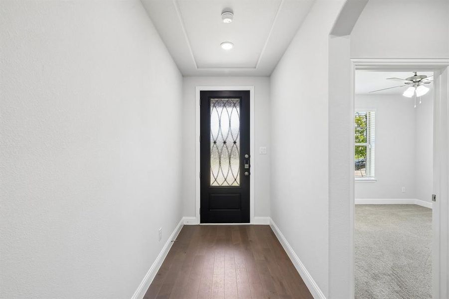 Entryway with wood floors Entryway with wood floors