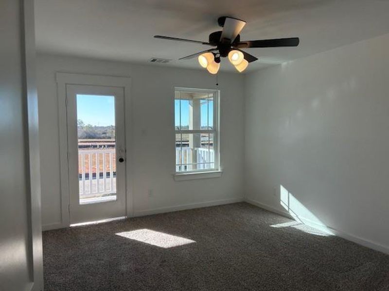 Bedroom with balcony access