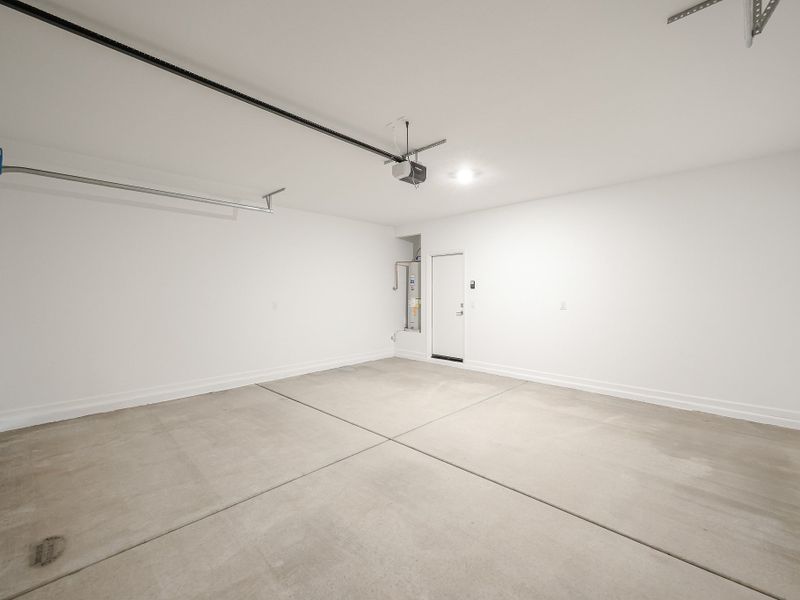 A hallway with white walls. A hallway with white walls.