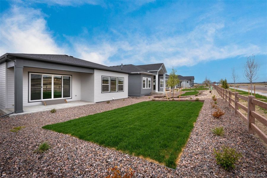 Front exterior of a new home in Wolf Ranch - Enclave Collection, Colorado Springs, CO, highlighting curb appeal (Image 24).