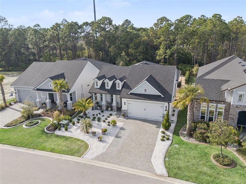 Front exterior of a new home in , Port Orange, FL, highlighting curb appeal (Image 25). Front exterior of a new home in , Port Orange, FL, highlighting curb appeal (Image 25).