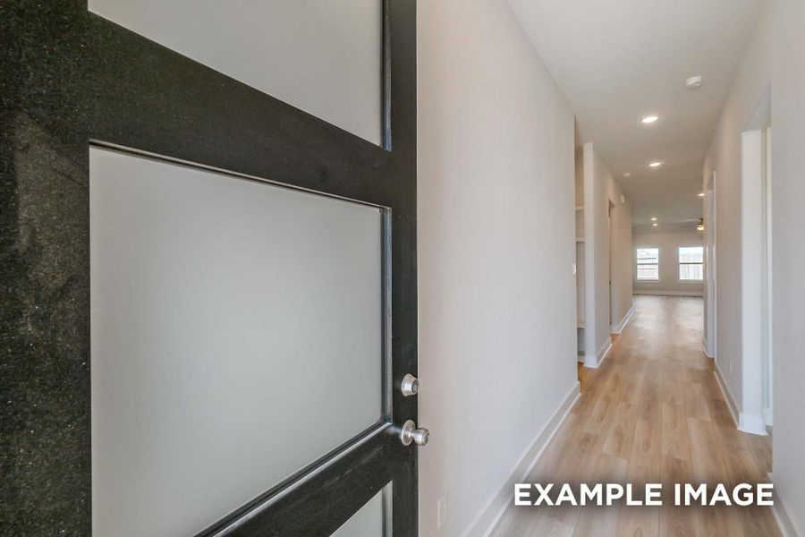 Spacious, unfurnished interior of a new home in Sunterra, Katy (Image 14).