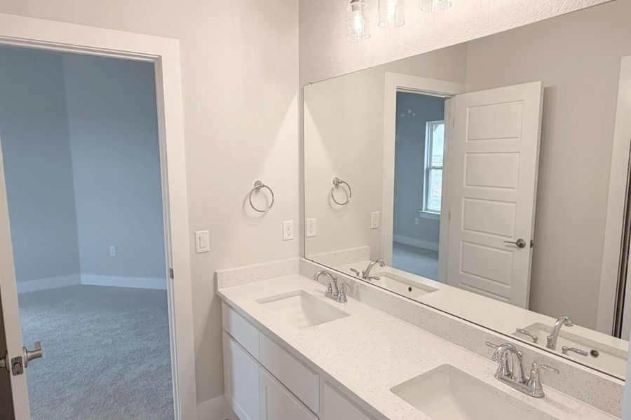 Furnished interior view inside a new home in The Grove at Blackhawk, Pflugerville (Image 8). Furnished interior view inside a new home in The Grove at Blackhawk, Pflugerville (Image 8).