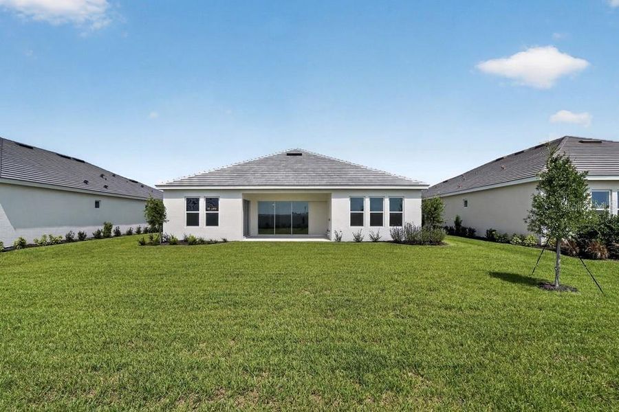 Exterior details and patio area of a home in Coasterra Community Group Page, Palmetto (Image 3).